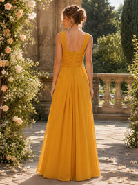 Butterscotch chiffon A-line floor-length bridesmaid dress back view with wide straps, ruched bodice, and concealed zipper
