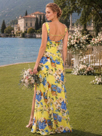 Floral chiffon bridesmaid dress with open back, tie detail, cascading ruffle, and flowing floor-length skirt