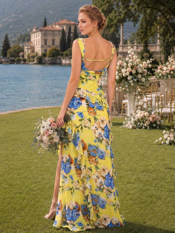 Floral chiffon bridesmaid dress with open back, tie detail, cascading ruffle, and flowing floor-length skirt
