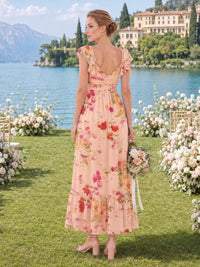 Floral chiffon bridesmaid dress with open back, tie detail, ruffled cap sleeves, and ankle-length A-line silhouette