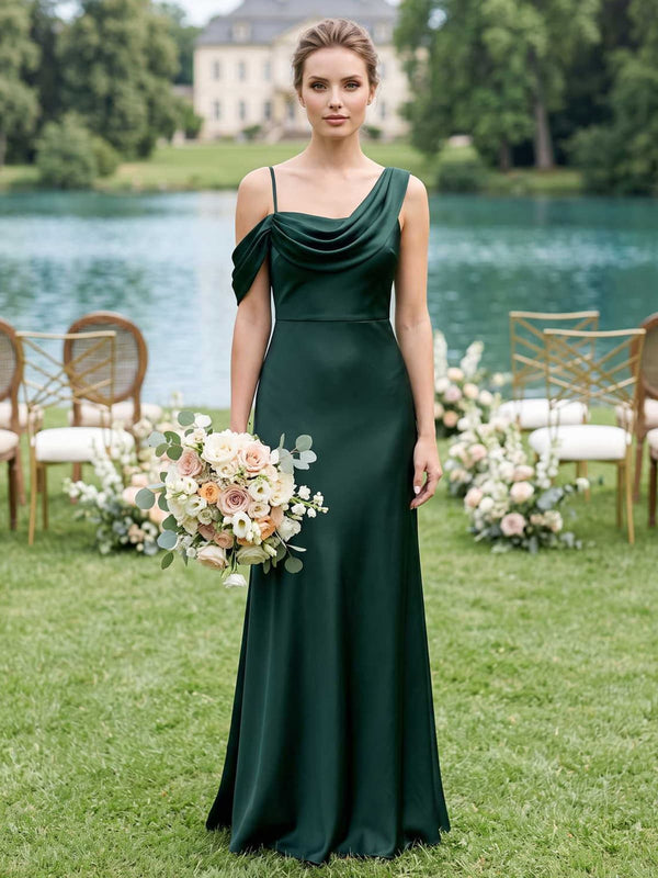 Dark green faux silk A-line bridesmaid dress with cowl neckline, spaghetti straps, draped shoulder detail, and floor-length skirt