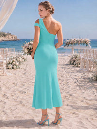 Turquoise chiffon bridesmaid dress with asymmetric open back, one-shoulder strap detail, fitted sheath silhouette, and ankle-length skirt