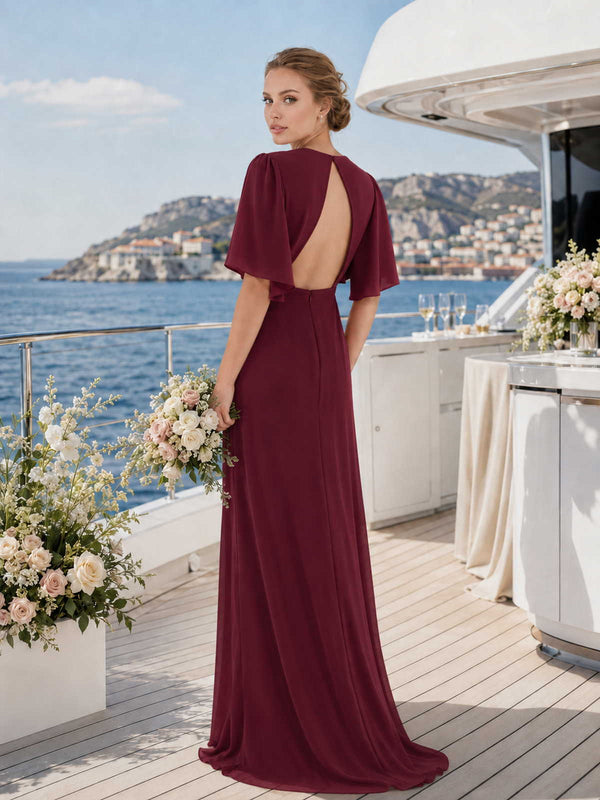 Burgundy chiffon bridesmaid dress with open back, flutter sleeves, center back zipper, and flowing floor-length skirt