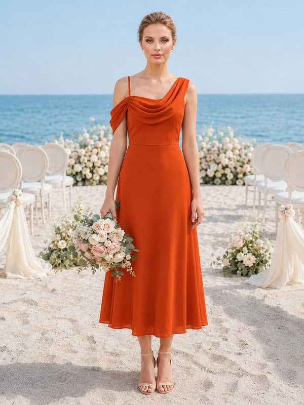 Burnt orange chiffon bridesmaid dress with asymmetric neckline, draped bodice, and flowing midi-length A-line skirt