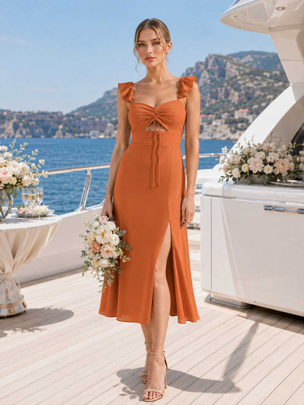Front view of a burnt orange chiffon midi bridesmaid dress with sweetheart neckline, ruffle straps, tie front detail, front slit, and A-line skirt.