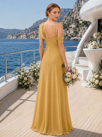 Back view of a mustard yellow chiffon floor-length bridesmaid dress with spaghetti straps, open back, soft shoulder draping, center back zipper, and flowing A-line skirt.