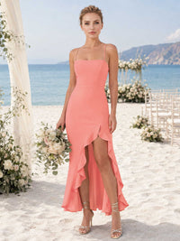 Front view of a coral chiffon midi bridesmaid dress with square neckline, spaghetti straps, front slit, cascading ruffle detail, and fitted sheath silhouette.