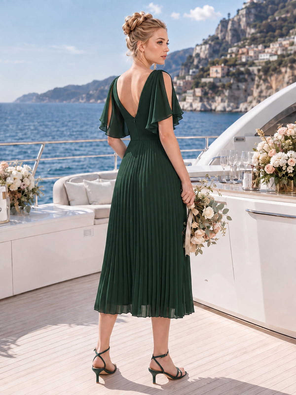 Back view of a dark green chiffon midi bridesmaid dress with deep V-back, split flutter sleeves, fitted waist, and flowing pleated A-line skirt.
