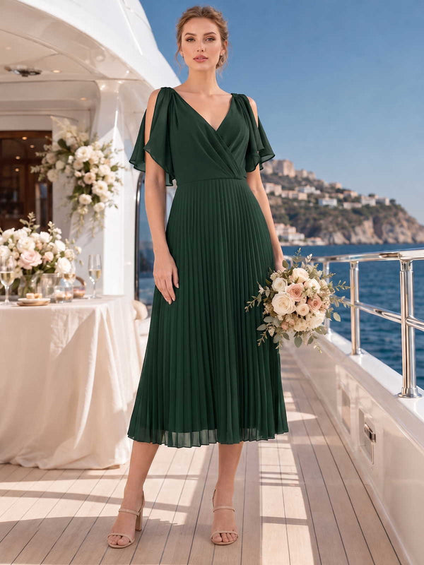 Front view of a dark green chiffon midi bridesmaid dress with V-neck crossover bodice, split flutter sleeves, fitted waist, and flowing pleated A-line skirt.