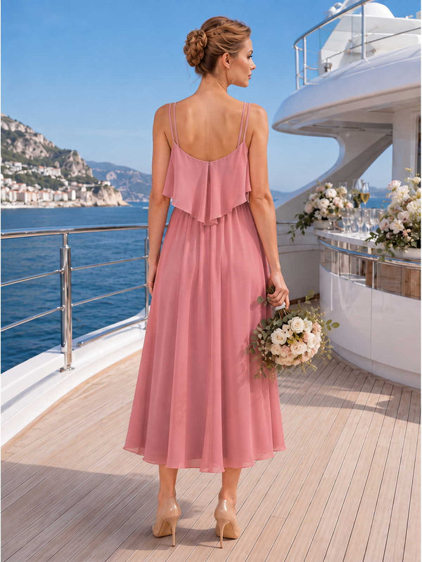 Back view of a  desert  rose chiffon tea-length bridesmaid dress with double straps, layered back flutter overlay, softly gathered waist, and flowing A-line skirt.