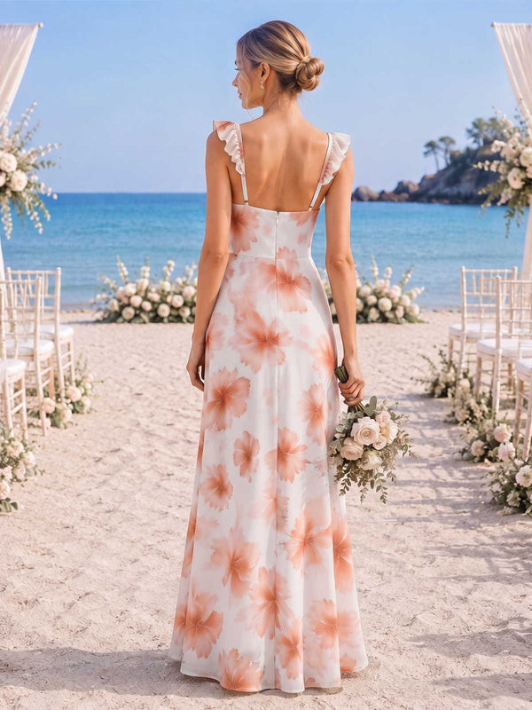 Back view of a floral chiffon floor-length bridesmaid dress with ruffle straps, low square back, center-back zipper, fitted waist, watercolor floral print, and softly flowing A-line skirt.