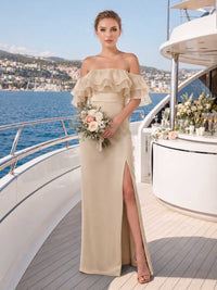 Front view of a champagne satin floor-length bridesmaid dress with off-shoulder neckline, layered organza ruffle overlay, fitted waist, high front slit, and elegant A-line skirt.