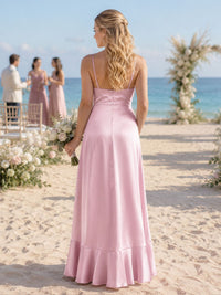 Back view of a light pink imitation silk bridesmaid dress featuring slim spaghetti straps, a clean straight-back bodice, concealed center-back zipper, defined waist, flowing A-line skirt, and softly flared ruffle hem.