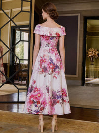 Floral print A-line off-shoulder tea-length evening dress back view with defined waist and concealed zipper