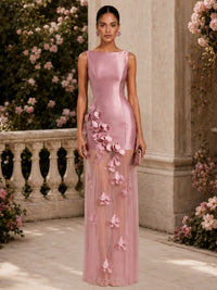 Satin sheath boat-neck floor-length evening dress front view with floral appliqué details and sheer skirt overlay