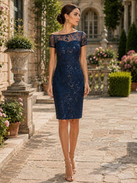 Chiffon lace sheath bateau-neck midi-length evening dress front view with illusion lace sleeves and fitted bodice
