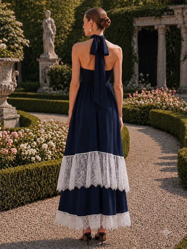 Satin A-line halter-neck tea-length evening dress back view with open back tie, lace trim panels, and tiered skirt