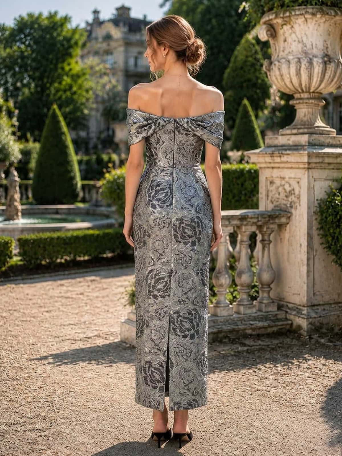 Jacquard satin off shoulder midi length evening dress back view with floral texture and back slit