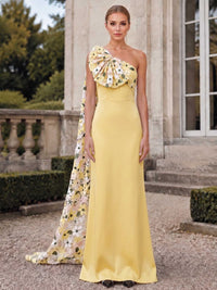 Floral one shoulder floor length evening dress front view with draped cape overlay and statement shoulder detail