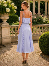 Faux silk midi length evening dress back view with fitted bodice and layered ruffle details