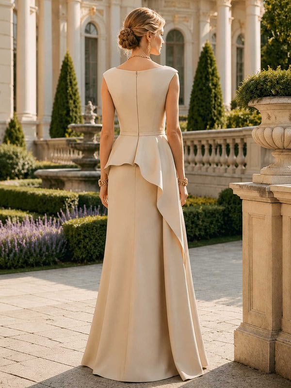 Satin floor length evening dress back view with sleeveless bateau neckline and asymmetric peplum detail
