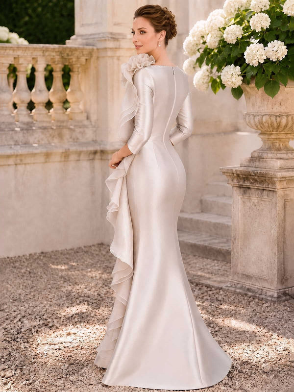 Satin sheath evening dress back view with concealed zipper, fitted silhouette and layered ruffle overlay detail