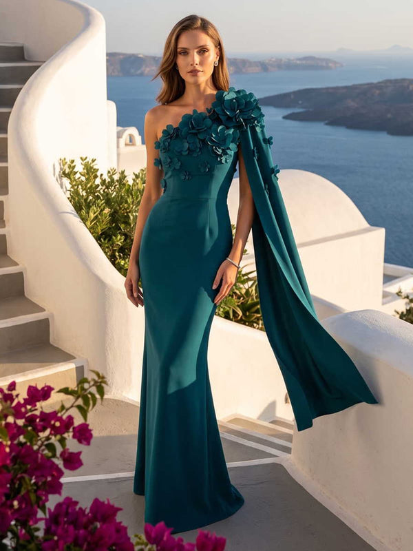Satin one-shoulder mermaid mother of the bride dress front view with 3D floral shoulder detail and flowing cape panel