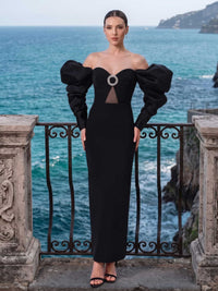 Black satin off shoulder mother of the bride dress front view with puff long sleeves and brooch cutout detail