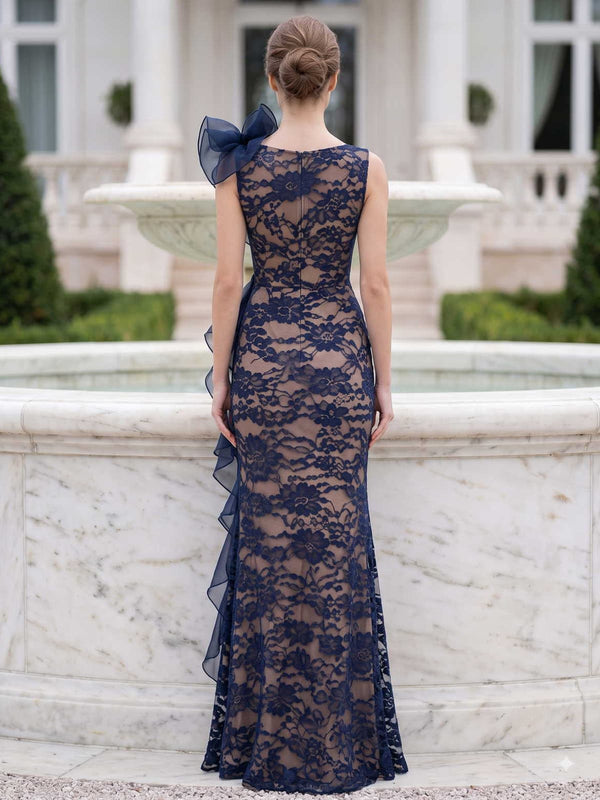 Floral lace mother of the bride dress back view with illusion back, organza shoulder ruffle, floor length mermaid silhouette, and concealed zipper