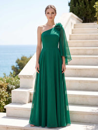 Green chiffon mother of the bride dress front view with one shoulder neckline, floral applique cape, defined waist, and floor length A-line skirt