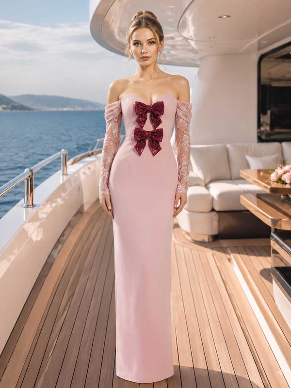Satin mother of the bride dress front view with off-shoulder neckline, sheer lace long sleeves, burgundy bow accents, fitted bodice, and floor length slim skirt