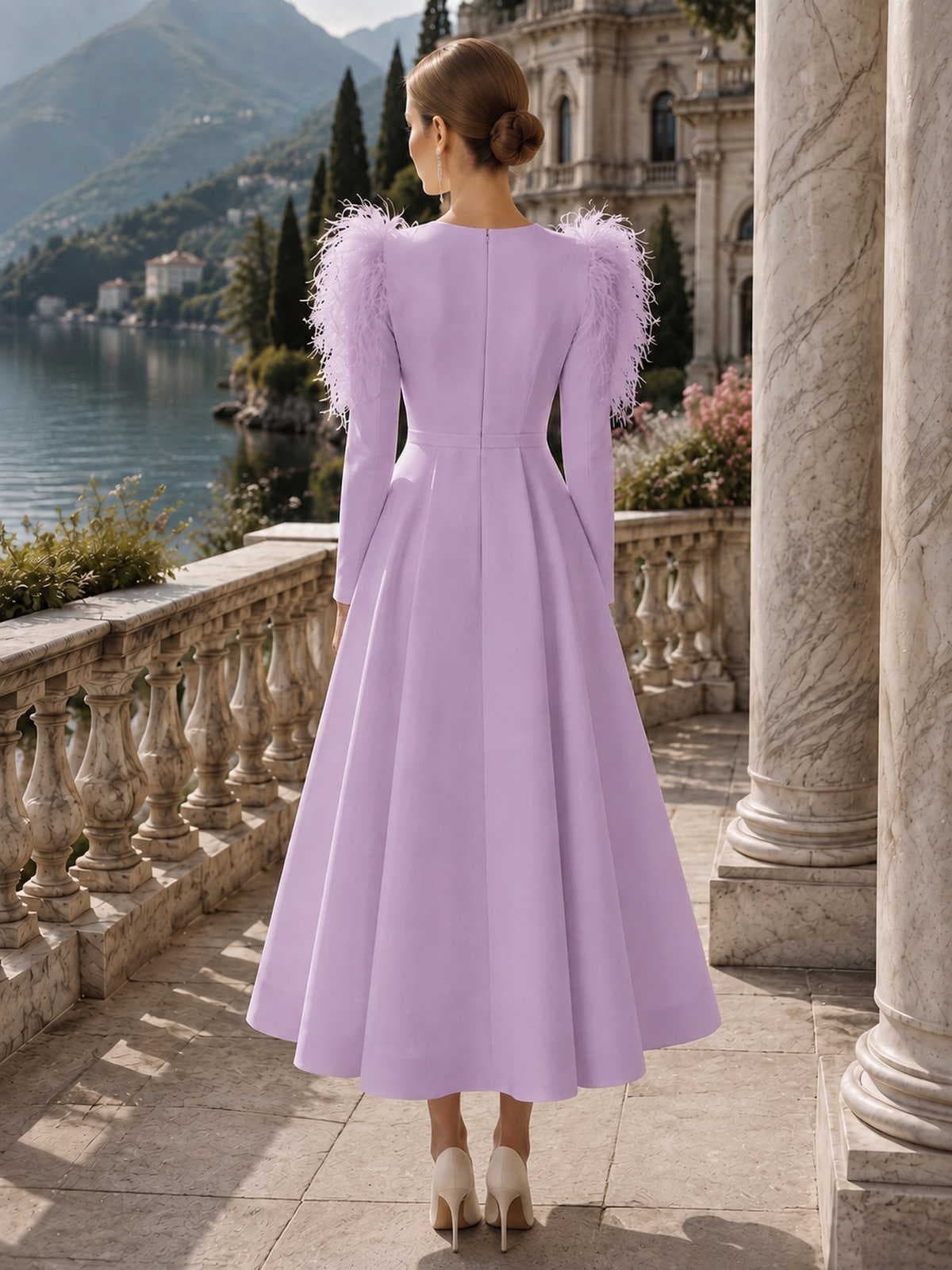 Satin mother of the bride dress back view with feather shoulder detail, long sleeves, concealed back zipper, defined waist, and tea length A-line skirt