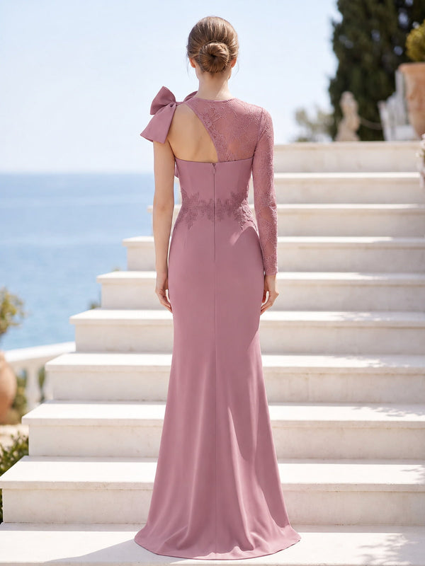 Dusty rose satin mother of the bride dress back view with asymmetrical lace shoulder, one long lace sleeve, bow detail, concealed back zipper, and floor length skirt