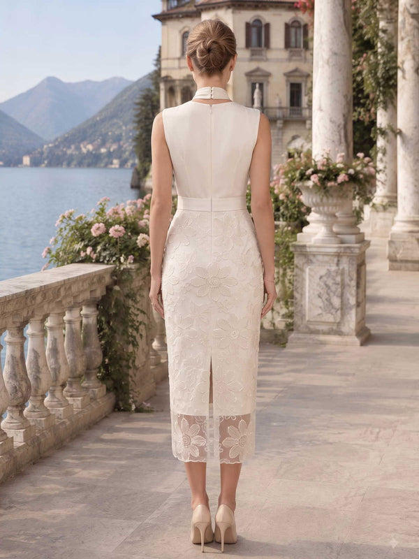Satin lace mother of the bride dress back view with halter neckline, concealed back zipper, fitted waist, floral lace applique, back slit, and tea length sheath skirt