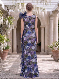 Floral lace mother of the bride dress back view with sleeveless bodice, concealed back zipper, navy tulle side ruffle, fitted silhouette, and floor length skirt