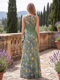 Floral lace mother of the bride dress back view with sleeveless bateau neckline, concealed back zipper, draped waist detail, and floor length floral skirt