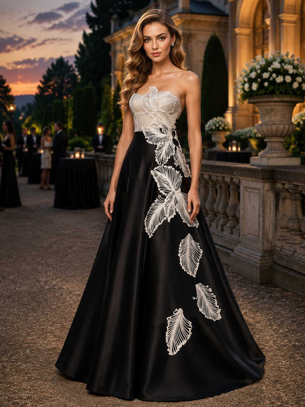 Mother of the bride satin evening dress front view with strapless contrast bodice, floral appliqué placement, defined waist, and floor length A-line skirt