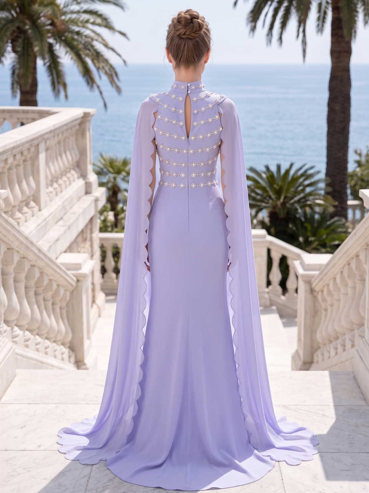 Lilac mother of the bride chiffon evening dress back view with keyhole back, beaded bodice, cape sleeves, and floor length sheath silhouette