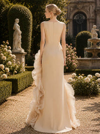 Champagne satin mother of the bride dress back view with sleeveless bodice, concealed back zipper, fitted silhouette, floor length skirt, and side organza floral decoration