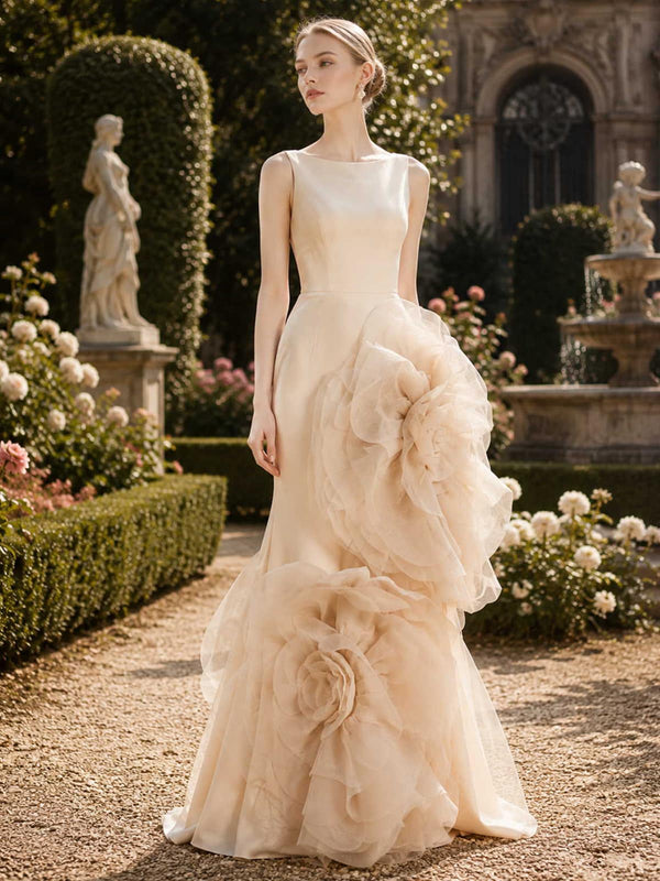 Champagne satin mother of the bride dress front view with sleeveless bateau neckline, fitted bodice, floor length skirt, and oversized organza 3D floral accents