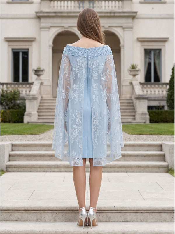Back view of a light blue chiffon knee-length mother of the bride dress with floral lace cape overlay, beaded neckline, sheer lace drape, center-back zipper, and fitted straight sheath skirt.