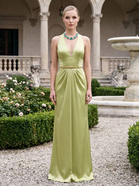 Front view of a light green satin floor-length mother of the bride dress with plunging halter V-neckline, fitted bodice, softly pleated waist, decorative beaded waistband, and flowing column skirt.