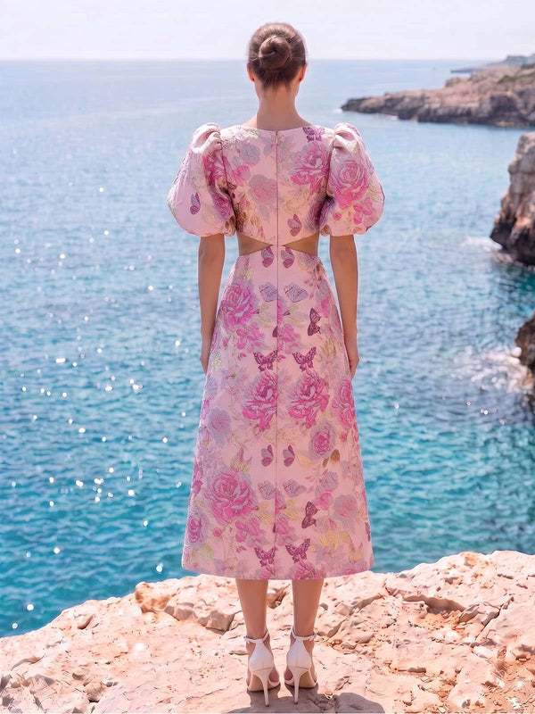 Back view of an As Pic Color floral jacquard satin tea-length mother of the bride dress with a square back, puff sleeves, concealed center-back zipper, floral jacquard pattern, and A-line silhouette.
