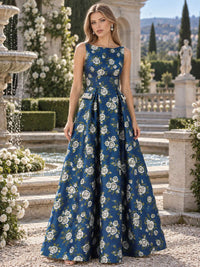 Front view of an as pic color floral jacquard satin floor length mother of the bride dress with boat neckline, sleeveless design, pocket details, floral pattern, and A-line silhouette.