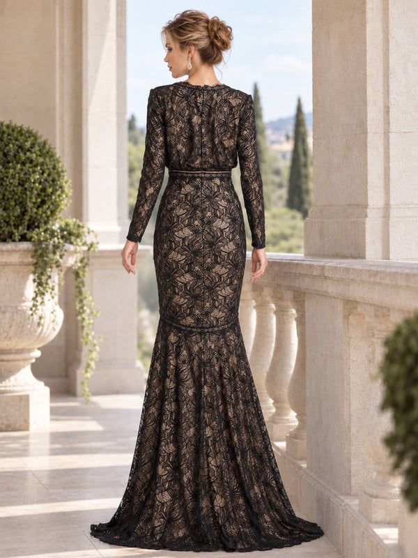 Back view of a floral lace mother of the bride dress featuring long lace sleeves, floral lace overlay with contrast nude lining, defined waist, concealed center-back closure and softly flared floor-length mermaid skirt.