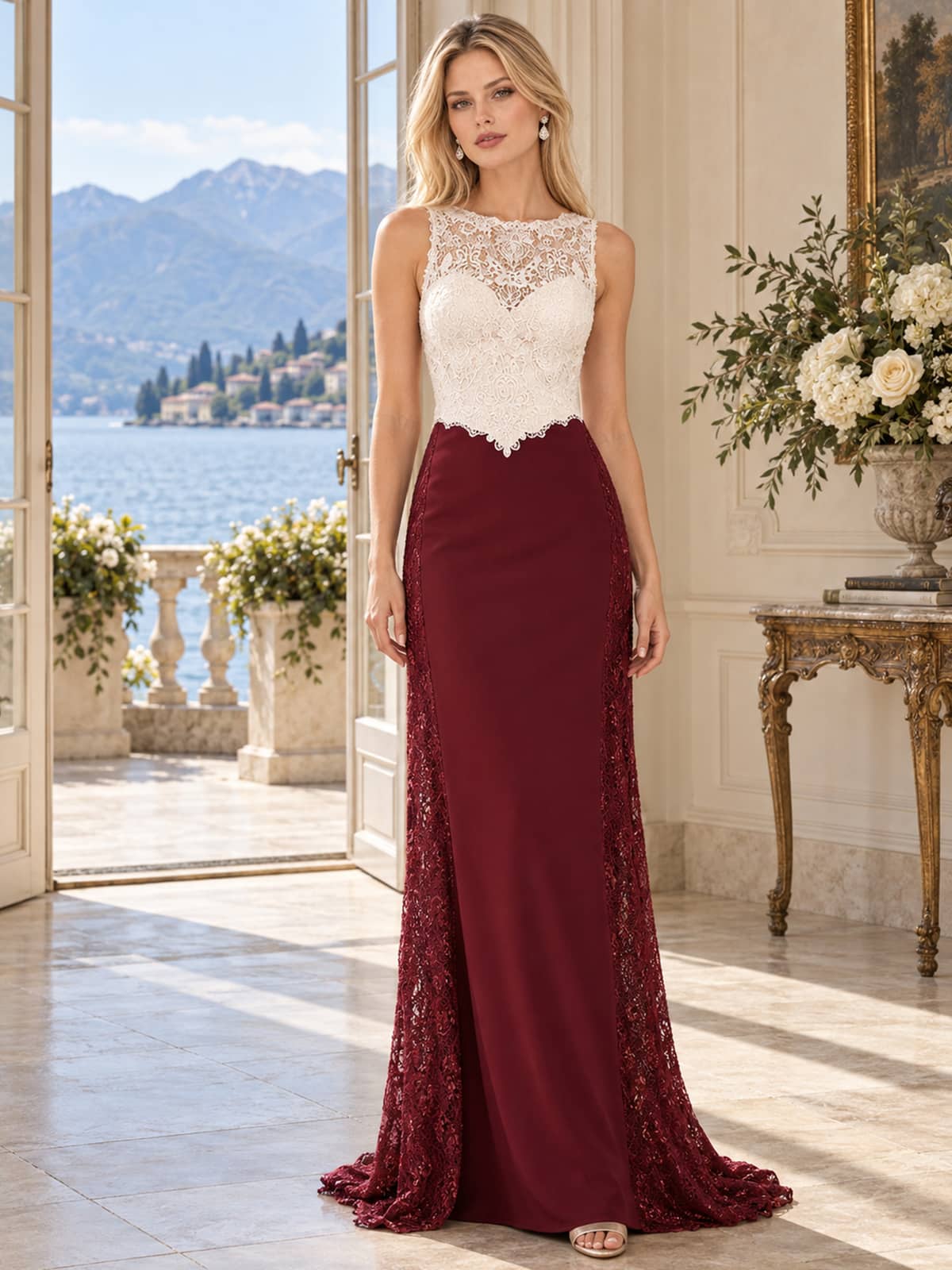 Front view of a two-tone lace and chiffon mother of the bride dress featuring an ivory floral lace illusion bodice, sleeveless neckline, scalloped waist detail, burgundy chiffon floor-length skirt and coordinating floral lace side panels.