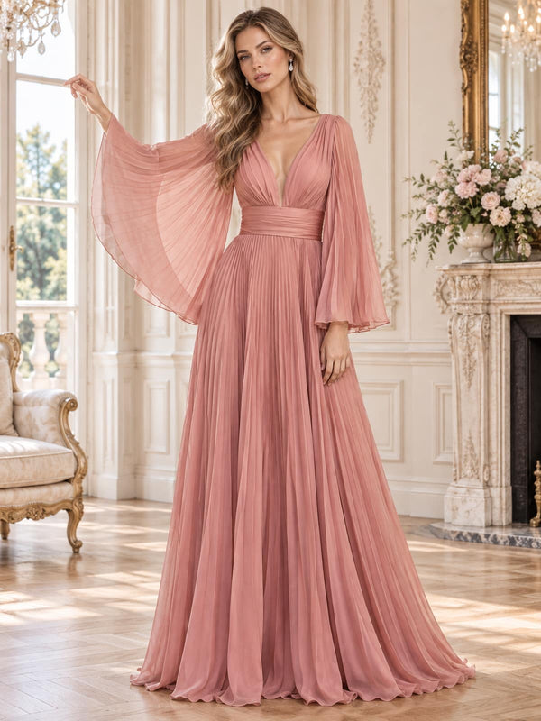 Front view of an elegant pleated chiffon mother of the bride dress featuring a deep V-neckline, flowing cape sleeves, wide pleated waistband and a full floor-length A-line skirt with fine vertical pleating.