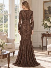 Back view of an elegant floral lace mother of the bride dress featuring fitted long lace sleeves, all-over floral lace detailing, a defined waist and a fitted mermaid silhouette flowing into a floor-length flared hem.