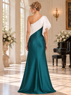 Back view of an elegant satin mother of the bride dress featuring an asymmetric one-shoulder chiffon overlay, soft cascading sleeve, clean fitted back, concealed center-back zipper and floor-length A-line skirt.