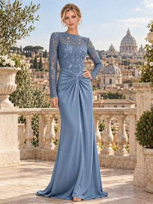 Front view of an elegant lace and satin mother of the bride dress featuring a jewel neckline, intricate floral lace bodice, sheer long lace sleeves, ruched knot waist and a draped floor-length sheath skirt.